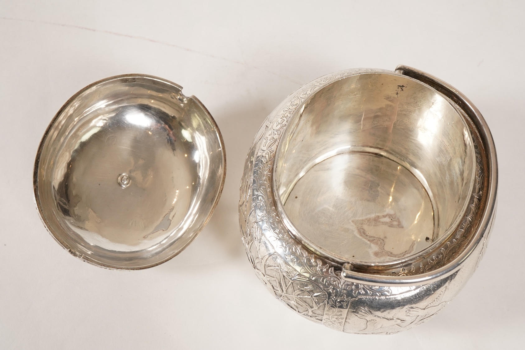 A Japanese Meiji period white metal tea caddy and cover with fluted knop, signed